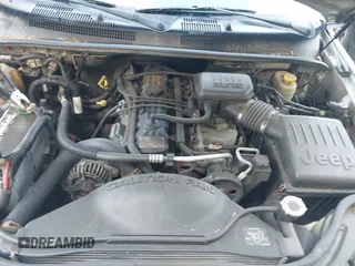 2002 Jeep Grand Cherokee Laredo z VIN 1J4GW48S62C261154, wystawiony jako IAAI lot #42602424 z przebiegiem 160 295 mil mil oraz . Historia ofert i sprzedaży dostępna na DreamBid. Obrazek 10.