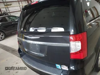 2012 Chrysler Town & Country Touring L with VIN 2C4RC1CGXCR170910, listed as a IAAI auction lot 41911179 with 167,850 mi miles and . Bid and sale history available at carsss.com. Image 16.