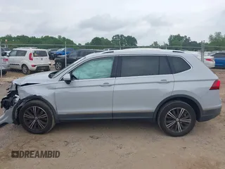 2018 Volkswagen Tiguan SEL z VIN 3VV3B7AXXJM039125, wystawiony jako IAAI lot #42125540 z przebiegiem 91 551 mil mil oraz . Historia ofert i sprzedaży dostępna na DreamBid. Obrazek 14.