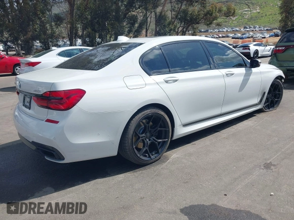 2017 BMW 7 Series 750i with VIN WBA7F0C32HGM22273, listed as a IAAI auction lot 41857151 with 90,518 mi miles and . Bid and sale history available at carsss.com. Image 4.
