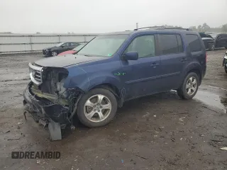 2014 Honda Pilot EX-L with VIN 5FNYF4H74EB047244, listed as a Copart auction lot 60017255 with 169,536 mi miles and Salvage title. Bid and sale history available at DreamBid. Image 1.