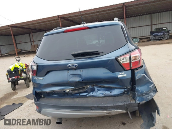 2018 Ford Escape SE with VIN 1FMCU0GD0JUC58115, listed as a IAAI auction lot 41578309 with 76,162 mi miles. Bid and sale history available at carsss.com. Image 16.