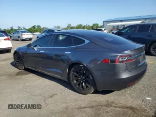 2017 Tesla Model S 100D с VIN 5YJSA1E2XHF185516, выставлен на аукционе Copart как лот 61816135 с пробегом 132 267 миль миль и Списание • Salvage title. История ставок и продаж доступна на DreamBid. Изображение 2.