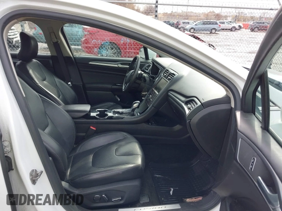 2016 Ford Fusion Titanium with VIN 3FA6P0K96GR158621, listed as a IAAI auction lot 41678349 with 182,162 mi miles. Bid and sale history available at carsss.com. Image 5.