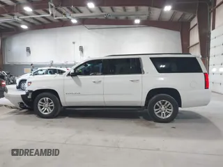 2016 Chevrolet Suburban LT with VIN 1GNSKHKC5GR452354, listed as a IAAI auction lot 42095900 with 109,220 mi miles and . Bid and sale history available at DreamBid. Image 14.