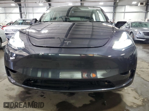 2024 Tesla Model Y Long Range with VIN 7SAYGDEE6RA253946, listed as a Copart auction lot 46699445 with 6,008 mi miles and Salvage Title. Bid and sale history available at DreamBid. Image 5.