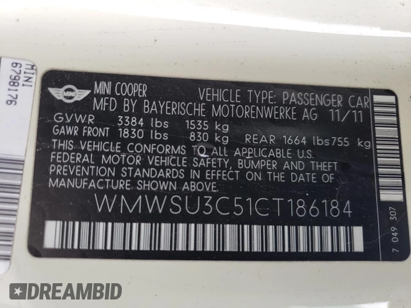 2012 MINI Hardtop with VIN WMWSU3C51CT186184, listed as a Copart auction lot 55090935 with 100,669 mi miles and Salvage Title. Bid and sale history available at DreamBid. Image 13.