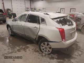 2016 Cadillac SRX Luxury Collection z VIN 3GYFNBE36GS572780, wystawiony jako IAAI lot #41347399 z przebiegiem 166 436 mil mil oraz . Historia ofert i sprzedaży dostępna na DreamBid. Obrazek 3.