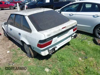 1989 Ford Escort z VIN 1FAPP9591KT185723, wystawiony jako IAAI lot #42257967 z przebiegiem 318 953 mil mil oraz . Historia ofert i sprzedaży dostępna na DreamBid. Obrazek 3.