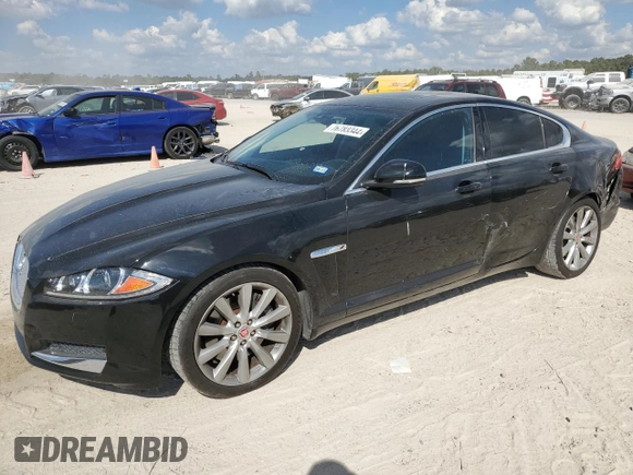 2014 Jaguar XF SC with VIN SAJWA0EX2E8U21886, listed as a Copart auction lot 76783344 with 97,280 mi miles and Salvage Title. Bid and sale history available at DreamBid. Image 1.