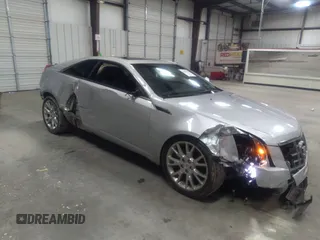 2012 Cadillac CTS Performance with VIN 1G6DJ1E31C0110232, listed as a IAAI auction lot 41185119 with 140,298 mi miles and . Bid and sale history available at carsss.com. Image 1.