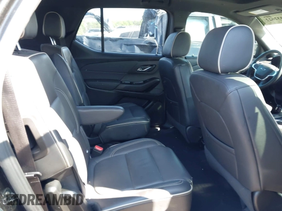 2023 Chevrolet Traverse Premier with VIN 1GNERKKW5PJ128805, listed as a IAAI auction lot 42032622 with 36,463 mi miles and . Bid and sale history available at DreamBid. Image 8.