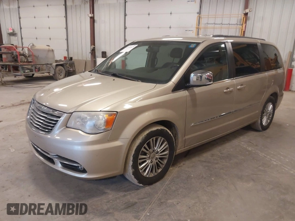 2013 Chrysler Town & Country Touring L with VIN 2C4RC1CG3DR606952, listed as a IAAI auction lot 42189429 with 145,654 mi miles and . Bid and sale history available at DreamBid. Image 2.