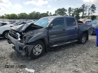 2015 Toyota Tacoma PreRunner z VIN 5TFJU4GN4FX067993, wystawiony jako Copart lot #57790895 z przebiegiem 195 292 mil mil oraz Szkoda całkowita • Salvage title. Historia ofert i sprzedaży dostępna na DreamBid. Obrazek 1.