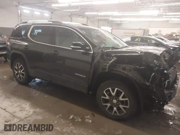 2021 GMC Acadia SLE with VIN 1GKKNRLS9MZ232758, listed as a IAAI auction lot 41548170 with 56,714 mi miles. Bid and sale history available at carsss.com. Image 1.