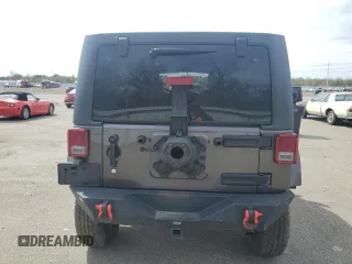 2018 Jeep Wrangler Unlimited Sahara with VIN 1C4BJWEG7JL856331, listed as a Copart auction lot 50246135 with 101,014 mi miles and Salvage title. Bid and sale history available at DreamBid. Image 6.