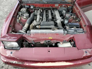 1987 Toyota Supra z VIN JT2MA71J4H0068594, wystawiony jako Copart lot #81918653 z przebiegiem 91 630 mil mil oraz Szkoda całkowita • Salvage title. Historia ofert i sprzedaży dostępna na DreamBid. Obrazek 11.