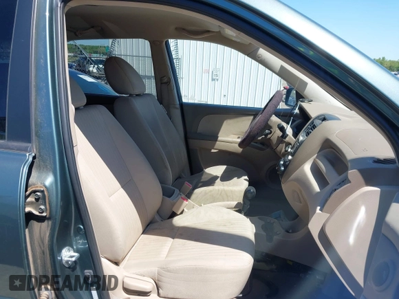 2009 Kia Sportage LX with VIN KNDJF724497602223, listed as a IAAI auction lot 42085415 with 91,105 mi miles. Bid and sale history available at carsss.com. Image 5.