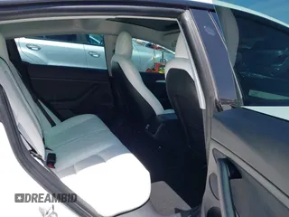 2022 Tesla Model 3 Long Range z VIN 5YJ3E1EB3NF348267, wystawiony jako IAAI lot #42323616 z przebiegiem Nie podano mil oraz . Historia ofert i sprzedaży dostępna na DreamBid. Obrazek 8.