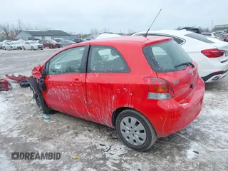 2011 Toyota Yaris with VIN JTDJT4K34B5329980, listed as a IAAI auction lot 41393540 with 84,987 mi miles. Bid and sale history available at carsss.com. Image 15.