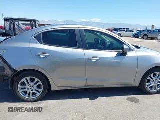 2016 Scion iA z VIN 3MYDLBZV1GY132561, wystawiony jako IAAI lot #42425947 z przebiegiem 94 882 mil mil oraz . Historia ofert i sprzedaży dostępna na DreamBid. Obrazek 14.