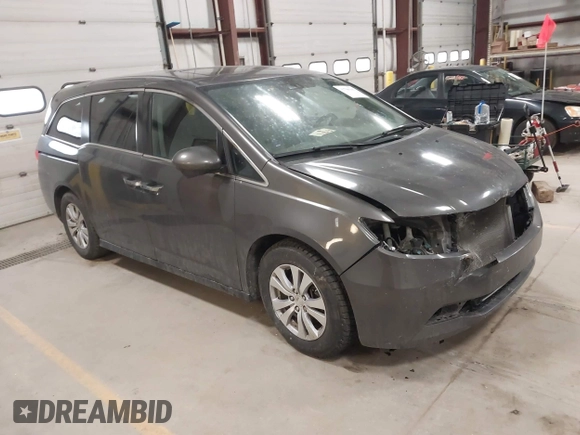 2015 Honda Odyssey EX-L with VIN 5FNRL5H64FB055890, listed as a IAAI auction lot 41706141 with 155,167 mi miles and . Bid and sale history available at carsss.com. Image 1.