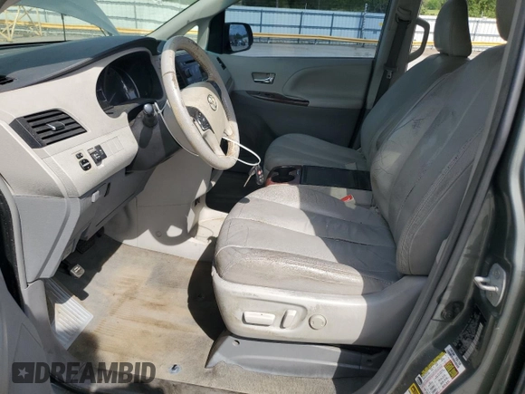2014 Toyota Sienna XLE with VIN 5TDYK3DC2ES439353, listed as a Copart auction lot 54332275 with 130,312 mi miles and Salvage Title. Bid and sale history available at DreamBid. Image 7.