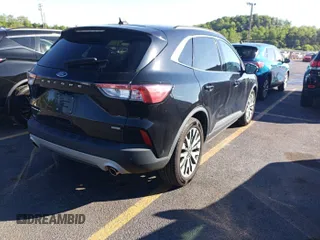 2020 Ford Escape Titanium Hybrid z VIN 1FMCU0DZ6LUC02215, wystawiony jako IAAI lot #42631411 z przebiegiem 88 615 mil mil oraz . Historia ofert i sprzedaży dostępna na DreamBid. Obrazek 1.