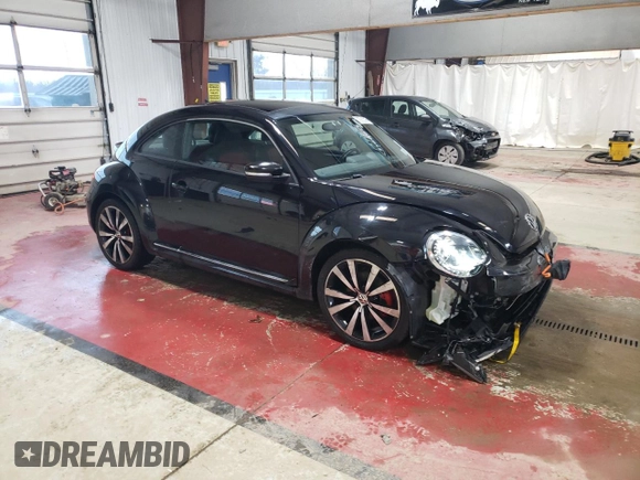 2012 Volkswagen Beetle Turbo with VIN 3VWVA7AT4CM665261, listed as a Copart auction lot 50562025 with 62,570 mi miles and Salvage Title. Bid and sale history available at DreamBid. Image 4.