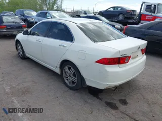 2005 Acura TSX with VIN JH4CL96825C002634, listed as a IAAI auction lot 42067243 with 262,009 mi miles and . Bid and sale history available at carsss.com. Image 3.