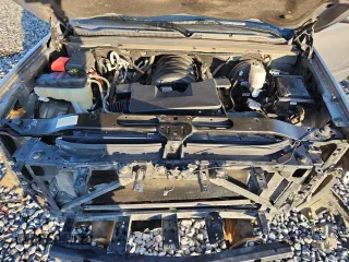 2019 Chevrolet Suburban LT with VIN 1GNSCJKC3KR129739, listed as a Copart auction lot 62377465 with 105,771 mi miles and Salvage title. Bid and sale history available at DreamBid. Image 12.