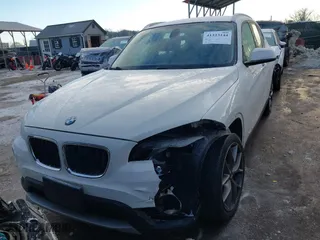 2013 BMW X1 28i with VIN WBAVM1C58DVW45962, listed as a IAAI auction lot 41323144 with 117,363 mi miles. Bid and sale history available at carsss.com. Image 12.