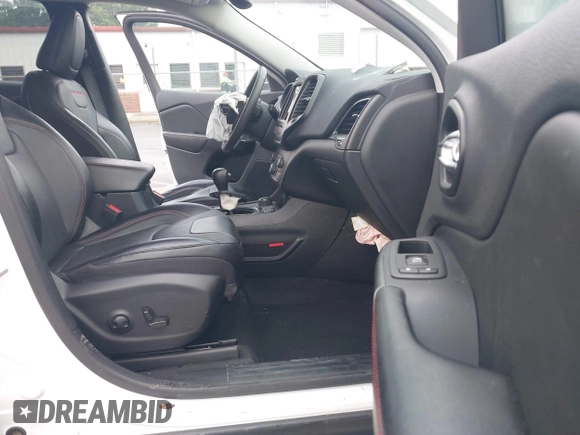 2022 Jeep Cherokee Trailhawk with VIN 1C4PJMBX1ND500729, listed as a IAAI auction lot 42235098 with 60,354 mi miles and . Bid and sale history available at DreamBid. Image 5.