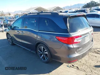 2018 Honda Odyssey Elite with VIN 5FNRL6H91JB052289, listed as a IAAI auction lot 41336068 with 94,685 mi miles and . Bid and sale history available at DreamBid. Image 3.