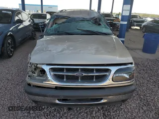1998 Ford Explorer XL z VIN 1FMZU34E4WUA14628, wystawiony jako Copart lot #47477325 z przebiegiem 88 954 mil mil oraz Szkoda całkowita • Salvage title. Historia ofert i sprzedaży dostępna na DreamBid. Obrazek 5.