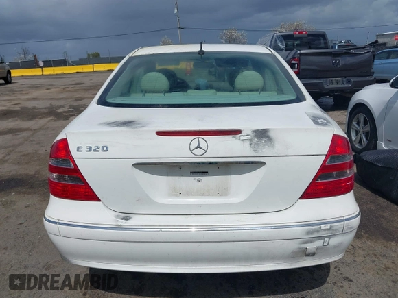 2003 Mercedes-Benz E-Class 3.2L with VIN WDBUF65J23A120318, listed as a IAAI auction lot 41927993 with 113,578 mi miles. Bid and sale history available at carsss.com. Image 16.