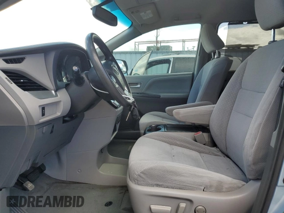 2015 Toyota Sienna LE AAS with VIN 5TDKK3DCXFS577990, listed as a Copart auction lot 56608525 with 93,323 mi miles and Salvage title. Bid and sale history available at DreamBid. Image 7.
