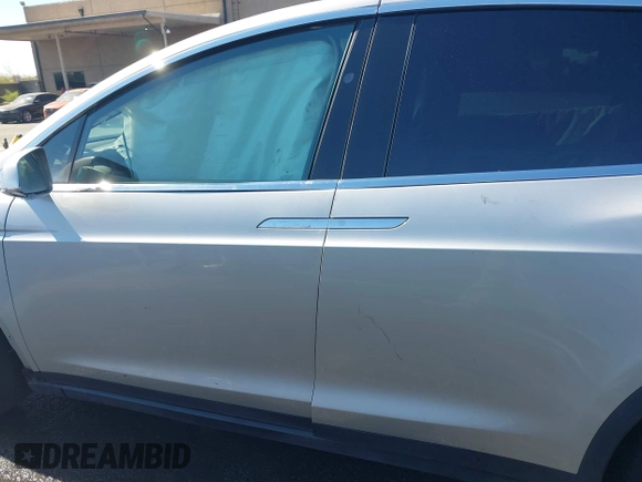 2016 Tesla Model X 70D with VIN 5YJXCAE21GF033123, listed as a IAAI auction lot 39813497 with 162,509 mi miles and . Bid and sale history available at DreamBid. Image 15.