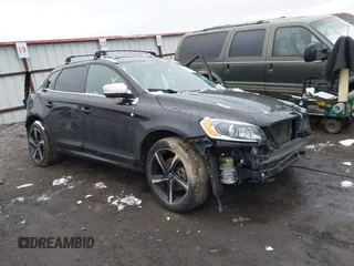 2014 Volvo XC60 R-Design Premier Plus with VIN YV4902DZ6E2552204, listed as a IAAI auction lot 41243009 with 76,964 mi miles and . Bid and sale history available at DreamBid. Image 1.