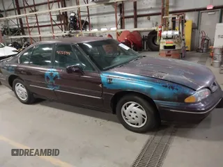 1999 Pontiac Bonneville SE z VIN 1G2HX52K2XH219410, wystawiony jako IAAI lot #41755411 z przebiegiem 187 752 mil mil oraz . Historia ofert i sprzedaży dostępna na DreamBid. Obrazek 1.