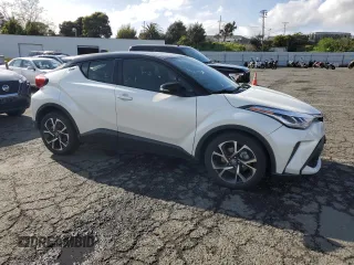 2020 Toyota C-HR LE with VIN JTNKHMBX7L1077252, listed as a Copart auction lot 51486305 with 64,213 mi miles and Salvage Title. Bid and sale history available at DreamBid. Image 4.