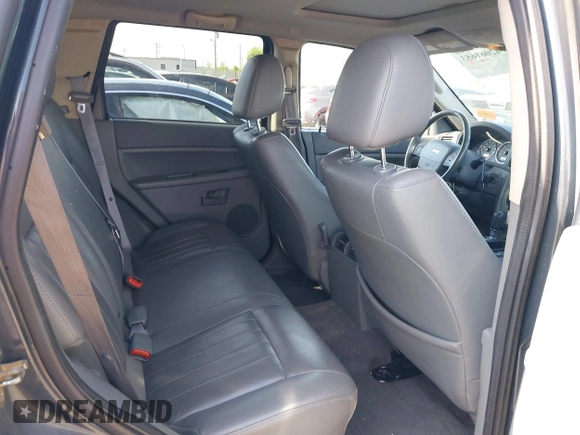 2007 Jeep Grand Cherokee Laredo with VIN 1J8GR48K77C582875, listed as a IAAI auction lot 42061653 with 259,767 mi miles. Bid and sale history available at carsss.com. Image 8.