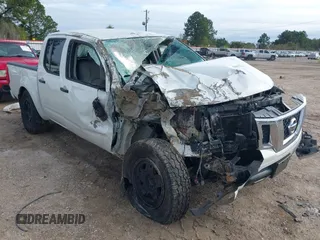 2017 Nissan Frontier SV z VIN 1N6DD0EV2HN765247, wystawiony jako IAAI lot #41017764 z przebiegiem 141 942 mil mil oraz . Historia ofert i sprzedaży dostępna na DreamBid. Obrazek 1.