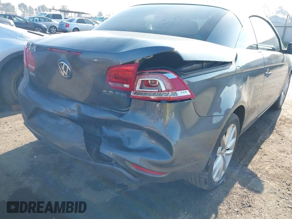 2015 Volkswagen Eos Komfort with VIN WVWBW8AH7FV004228, listed as a IAAI auction lot 41659825 with 71,468 mi miles and . Bid and sale history available at DreamBid. Image 6.