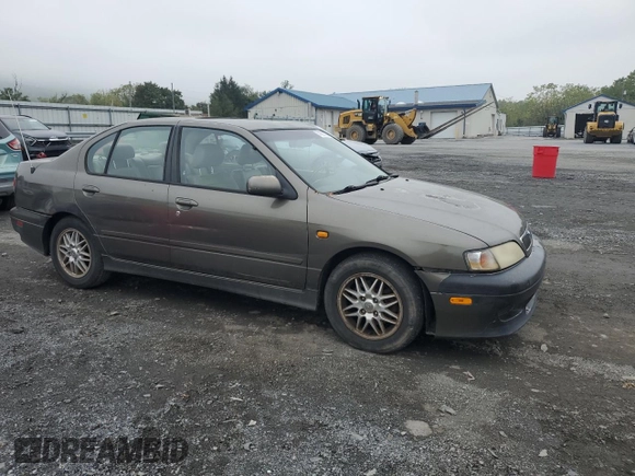 2000 Infiniti G20 Luxury z VIN JNKCP11A1YT304887, wystawiony jako Copart lot #74562724 z przebiegiem 202 140 mil mil oraz Czysty tytuł • Clean title. Historia ofert i sprzedaży dostępna na DreamBid. Obrazek 4.