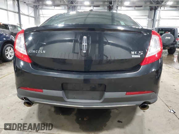 2013 Lincoln MKS with VIN 1LNHL9EK8DG611332, listed as a Copart auction lot 58043345 with 118,910 mi miles and Non repairable. Bid and sale history available at DreamBid. Image 6.