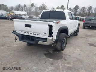 2019 Toyota Tacoma 4WD SR with VIN 5TFCZ5ANXKX204955, listed as a IAAI auction lot 41694378 with 108,410 mi miles. Bid and sale history available at carsss.com. Image 4.