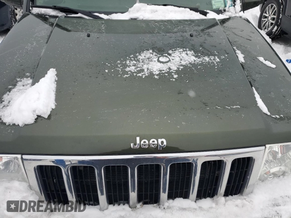 2007 Jeep Commander Overland with VIN 1J8HG68247C555994, listed as a Copart auction lot 86903914 with 219,294 mi miles and Salvage title. Bid and sale history available at DreamBid. Image 12.