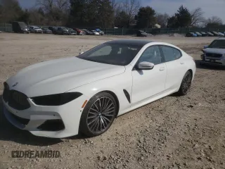 2022 BMW 8 Series M850i with VIN WBAGV8C03NCH10560, listed as a Copart auction lot 44026465 with 21,292 mi miles and Salvage Title. Bid and sale history available at carsss.com. Image 1.