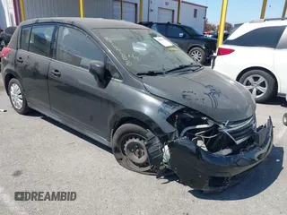 2012 Nissan Versa S with VIN 3N1BC1CPXCK250702, listed as a IAAI auction lot 41899436 with 136,378 mi miles. Bid and sale history available at carsss.com. Image 1.